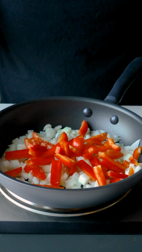 Then add in the bell pepper and jalapenos